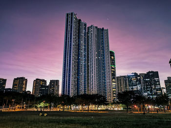 Modern buildings in city at night