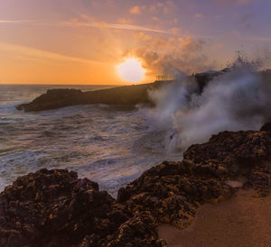 Scenic view of sea against sky during sunset