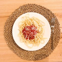 Directly above shot of noodles served on table