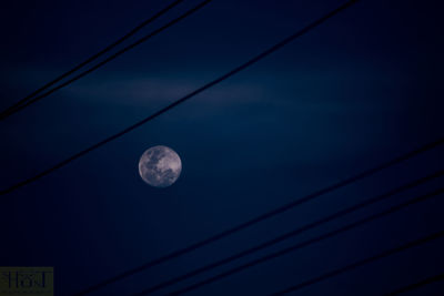 Low angle view of moon in sky