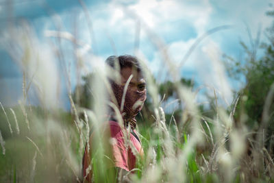 Woman standing on field