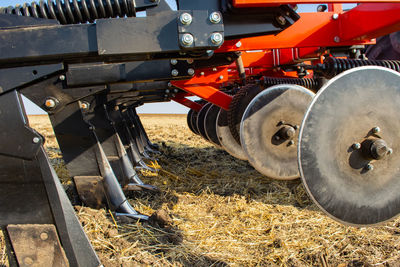 Close-up of tractor on field