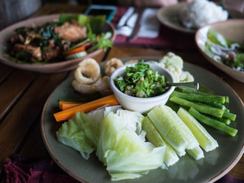 High angle view of chopped vegetables in bowl on table