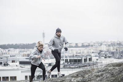 Sporty couple jogging together