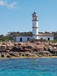 Lighthouse against blue sky
