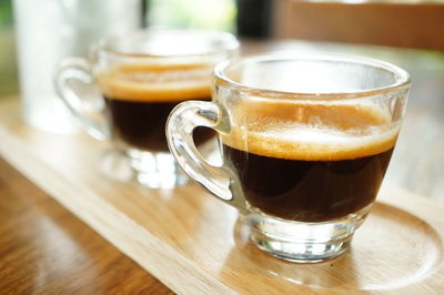 Close-up of coffee cup on table