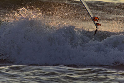 Person jumping in water