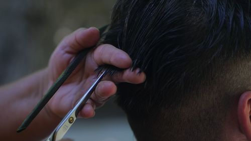 Close-up of hands working