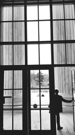Reflection of building on glass window