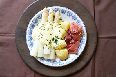 High angle view of breakfast served on table