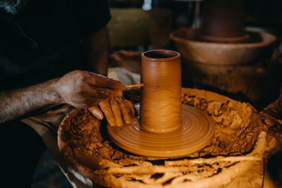 Man working with clay