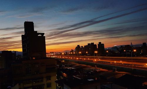 Illuminated cityscape at night