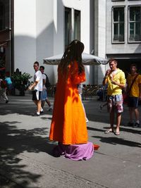 Woman standing in city