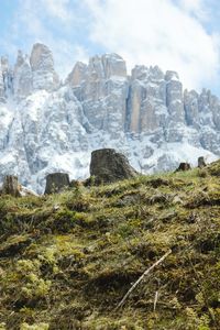 Scenic view of rocks on field against sky