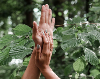 Close up of romantic couple stroking each other's hands. summer in love