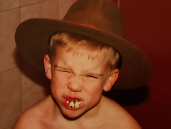 Close-up portrait of shirtless boy