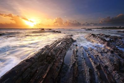 Scenic view of sea against sky during sunset