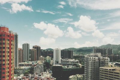 Modern cityscape against sky