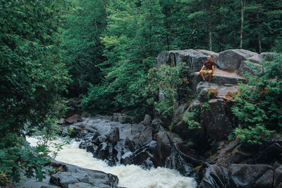 View of waterfall in forest