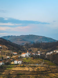 Scenic view of townscape against sky