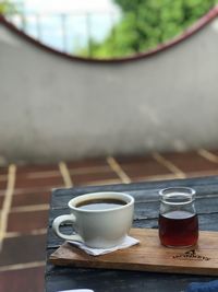 Close-up of coffee cup on table