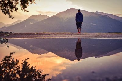 Scenic view of lake against sky during sunset