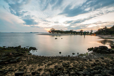 Idyllic view of sea against sky during sunrise