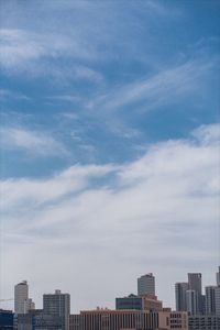 Modern buildings against blue sky