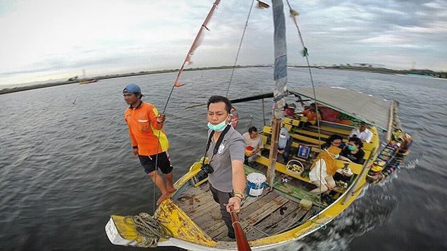 transportation, mode of transport, nautical vessel, water, boat, sea, sky, moored, lifestyles, leisure activity, rope, cloud - sky, travel, men, sailing, vacations, nature, river