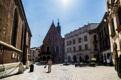 Woman walking on city street