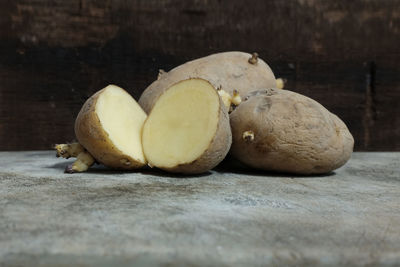 Close-up of potatoes on table