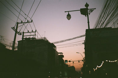 Low angle view of street light against sky