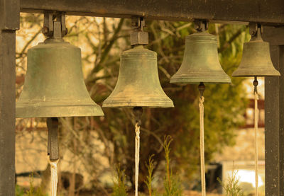 Close-up of lantern hanging in temple