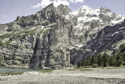 Scenic view of rocky mountains against sky