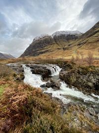 Scenic view of stream against sky