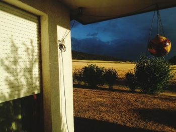 Field seen through glass window