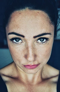 Close-up portrait of young woman