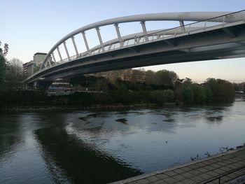 Bridge over river against sky