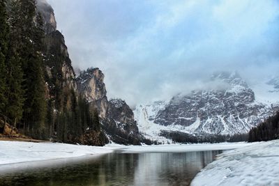 Scenic view of mountains against sky during winter