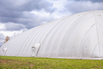 White inflatable hangar. canopy made of tarpaulin. prefabricated sports facilities.