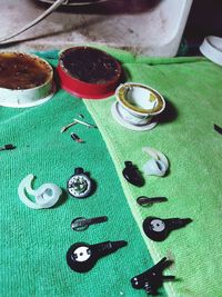 High angle view of various buttons on table