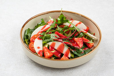 High angle view of salad in bowl on table