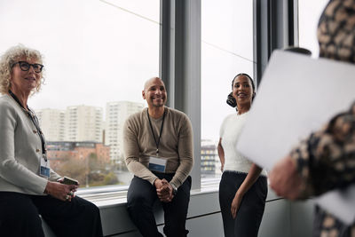 Business people talking during coffee break in office