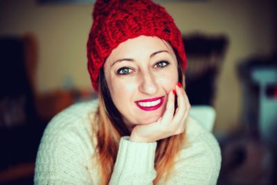 Close-up portrait of a smiling young woman