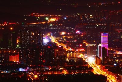 Illuminated cityscape at night