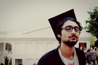 Portrait of man wearing mortarboard