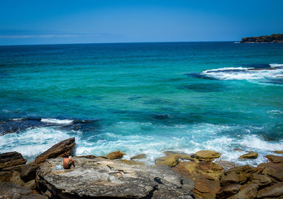 Scenic view of sea against clear sky