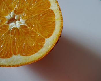 Close-up of lemon slice on table