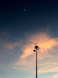 Low angle view of street light against sky