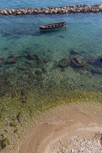 High angle view of ship moored on sea